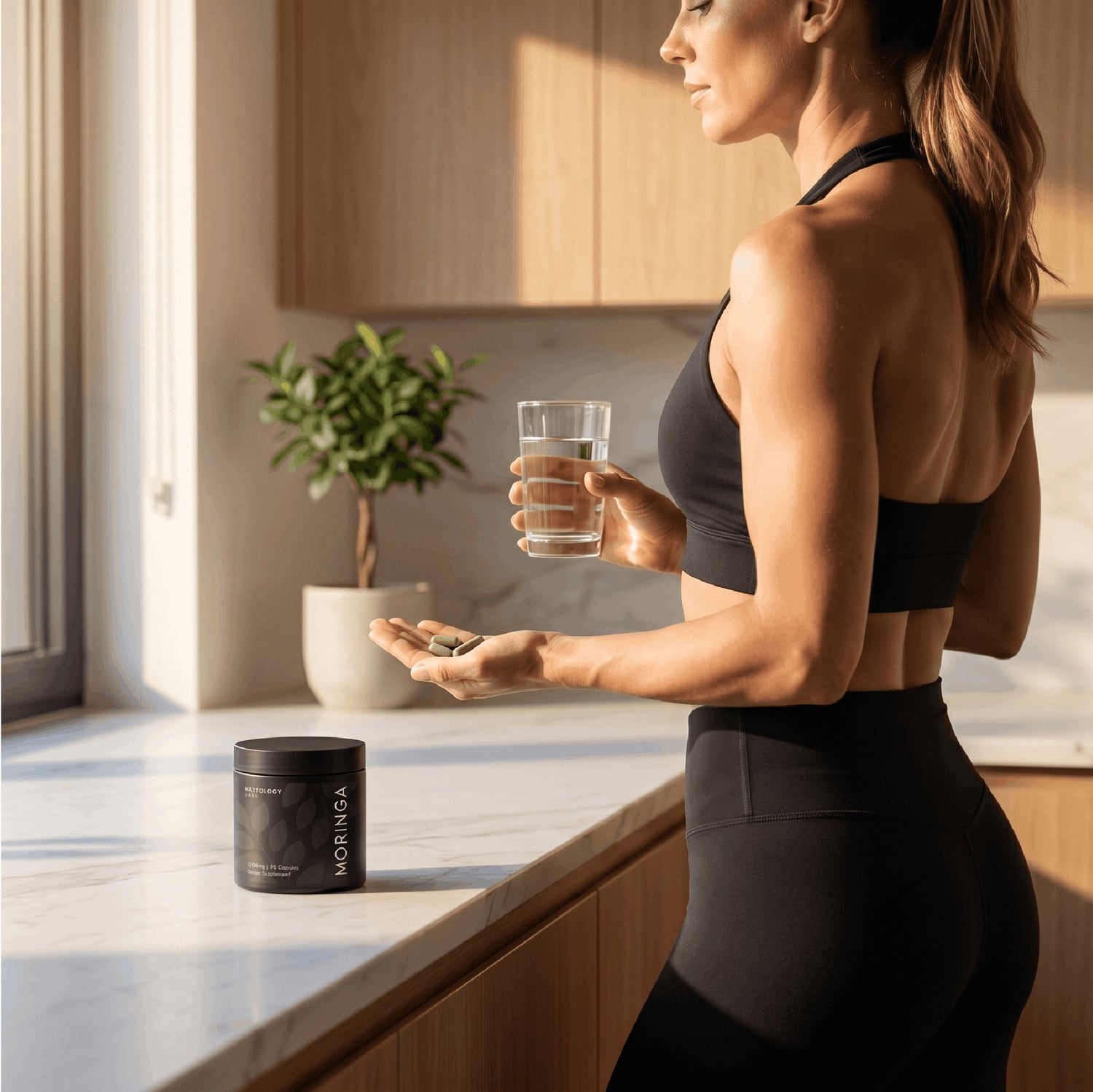 Taking Moringa capsules as part of a morning wellness routine